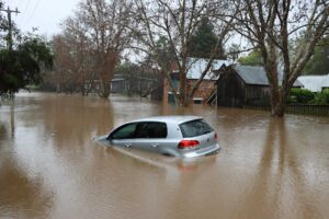 car in flooded street